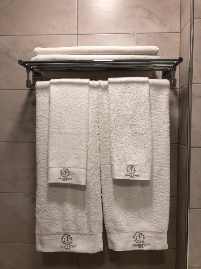 Grace Point Hotel Asztana Szoba fotó