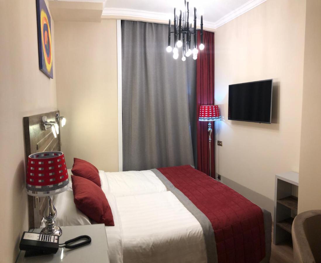 Grace Point Hotel Asztana Szoba fotó
