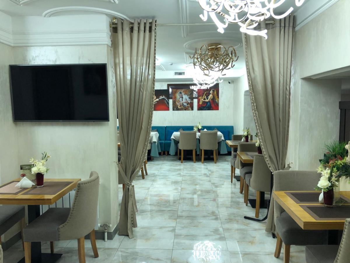 Grace Point Hotel Asztana Szoba fotó